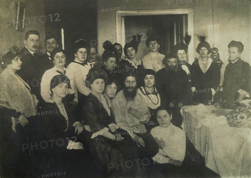 Rasputin surrounded by his admirers in St. Petersburg