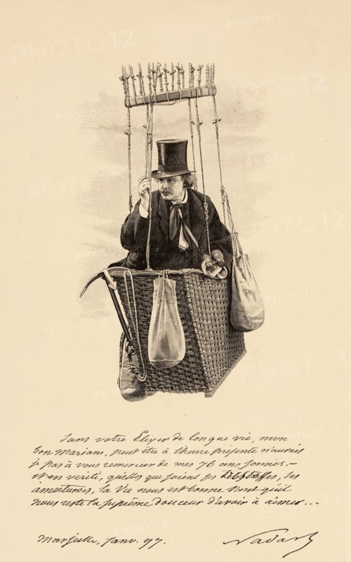 Félix Nadar, half-length portrait, standing in the basket of a balloon, holding binoculars