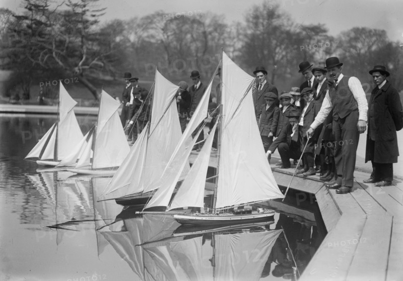People at the start of a model yacht race at Conservatory Lake, Central Park, New York City ca. 1910-1915