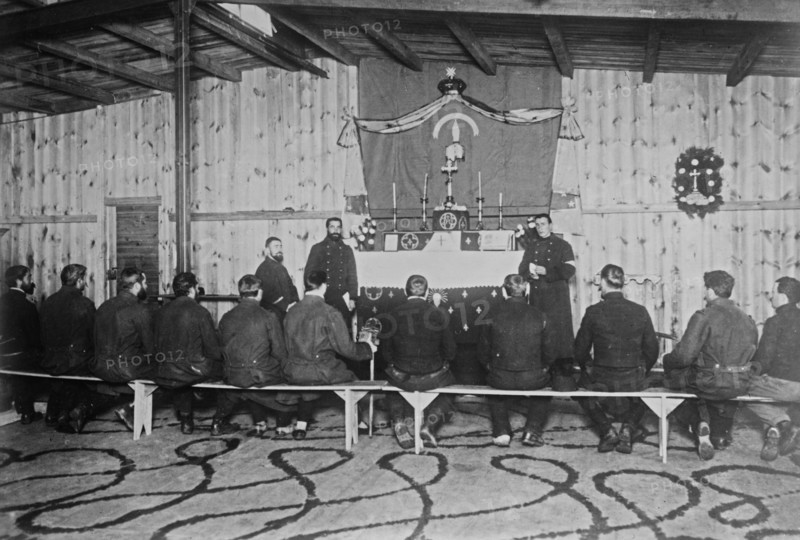 Russian prisoners seated in a chapel during services at Zossen prisoner of war camp, Wünsdorf, Zossen, Germany, during World War I ca. 1915