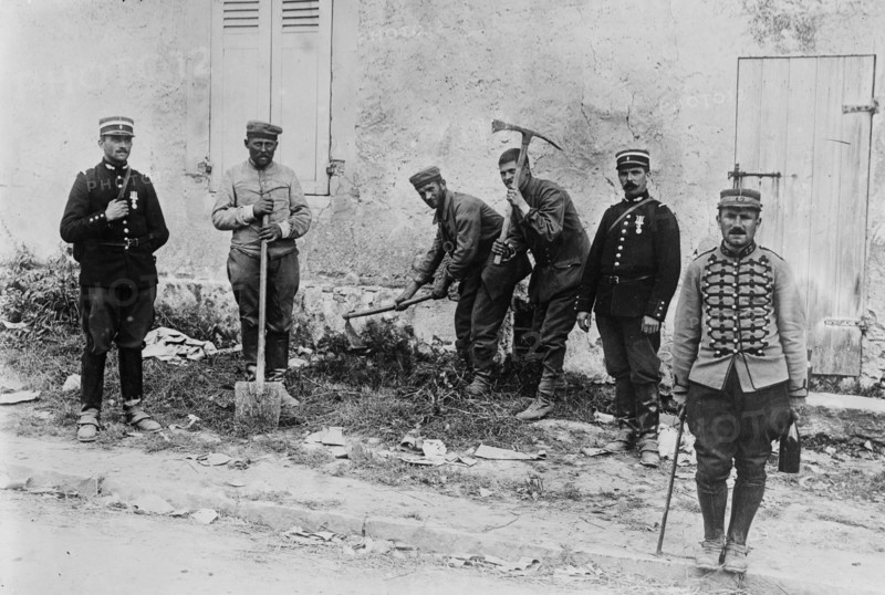 German prisoners working on a road between Villeroy and Neufmontiers, France during World War I ca. 1914