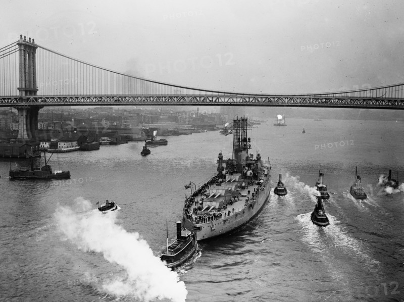 USS Wyoming (BB-32) Battleship, the Manhattan Bridge seen in the background ca. 1910-1915