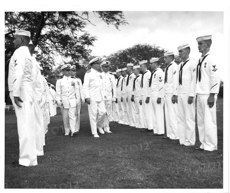 Air Station Barbers Point, Hawaii Original photo caption: 'Rea Admiral S. H. Evans, Commander of the 14th Coast Guard District, inspects personnel attached to the Coast Guard Air Detachment, Barbers Point, on Thursday November 5, 1959.