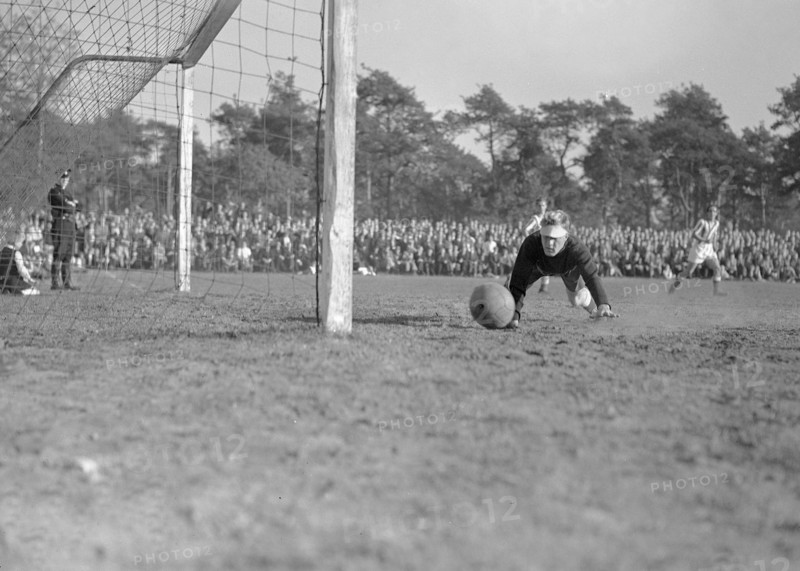 1940s Men's Soccer Match - AGOVV goalie is lucky with ball against post on October 10, 1947