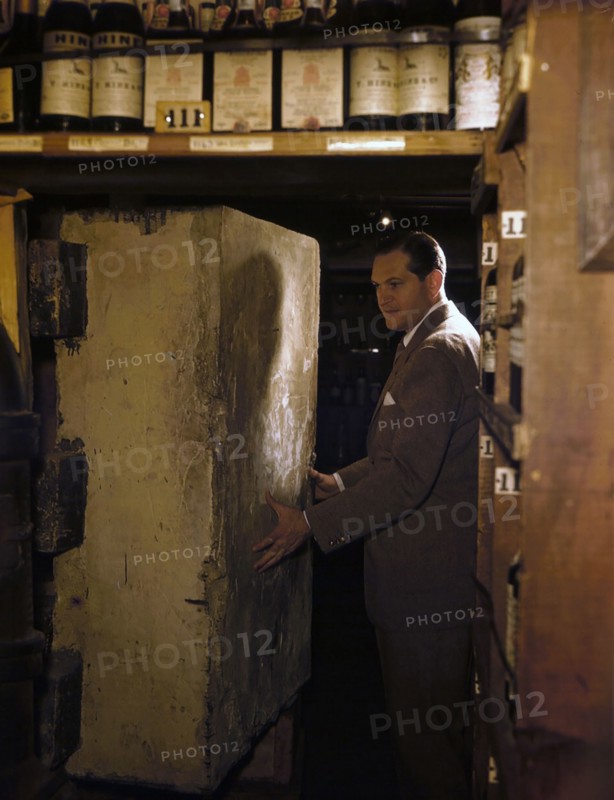 1948 - man entering a wine cellar at a night club in new york city