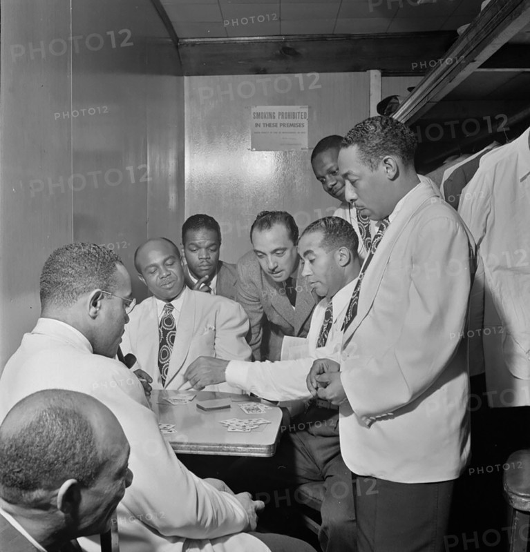 Portrait of Al Sears, Shelton Hemphill, Junior Raglin, Django Reinhardt, Lawrence Brown, Harry Carney, and Johnny Hodges, Aquarium, New York, N.Y., ca. Nov. 1946
