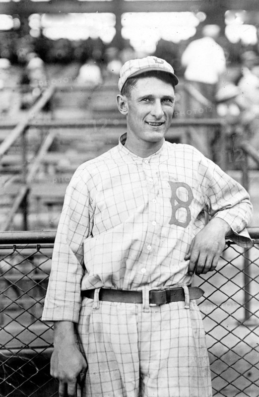 Ivan Massie Olson, Brooklyn baseball player, half-length portrait, standing, facing front, wearing baseball uniform 1916
