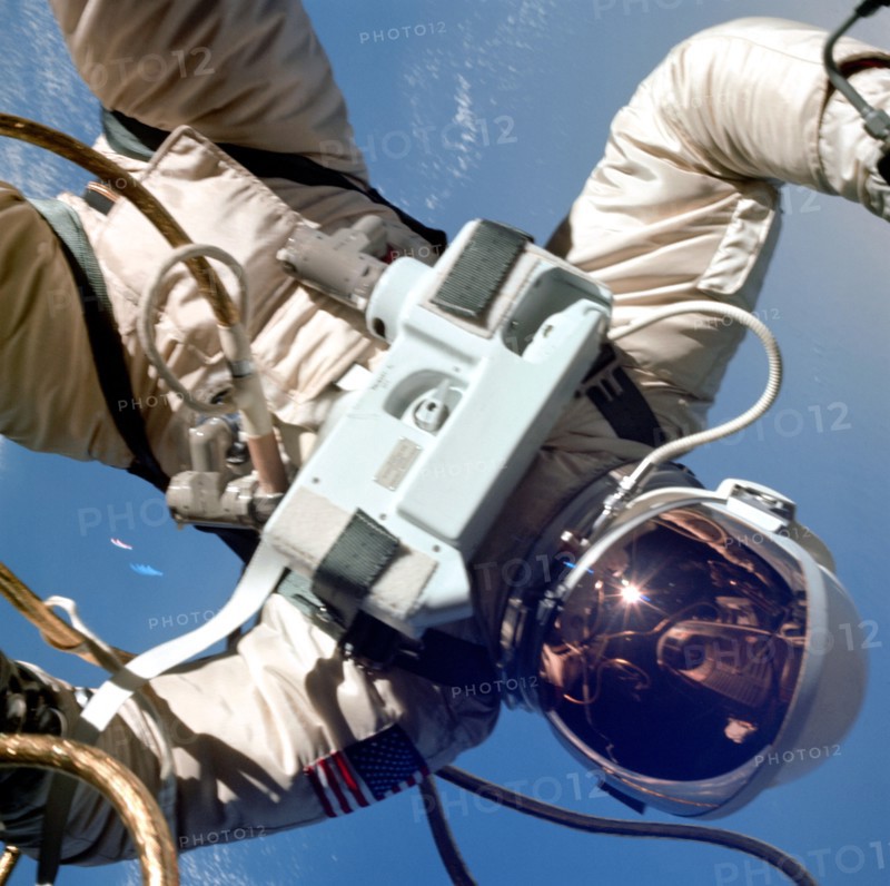 Astronaut Edward H. White II, pilot of the Gemini IV four-day Earth-orbital mission, floats in the zero gravity of space outside the Gemini IV spacecraft. (June 1965)