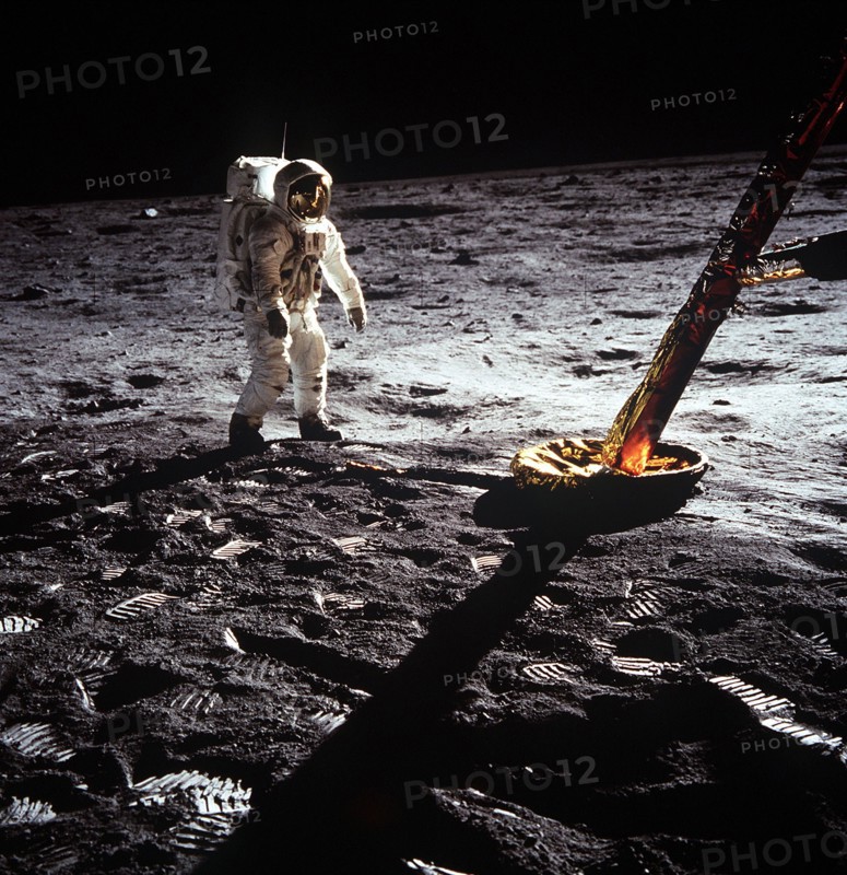 (20 July 1969) Astronaut Edwin E. Aldrin Jr., lunar module pilot, walks on the surface of the moon near a leg of the Lunar Module during the Apollo 11 extravehicular activity (EVA).