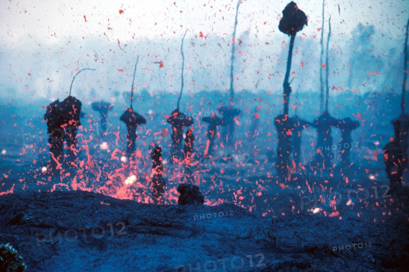 1983 - Hawaii Volcano - In the year of '83 amongst the schlopp and the spatter stood molds of tree trunks, whose lives did once matter. The lava, it flowed, it hugged those tree trunks, till nothing was left but burnt sticks and some stumps.