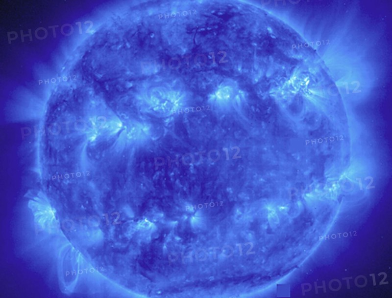 This EIT 171 image shows a wide variety of loops and active regions (lighter areas on the surface). Taken on November 9, 1998. The 171 filter shows emission from 8 and 9 times ionized iron at about 1 million degrees C.