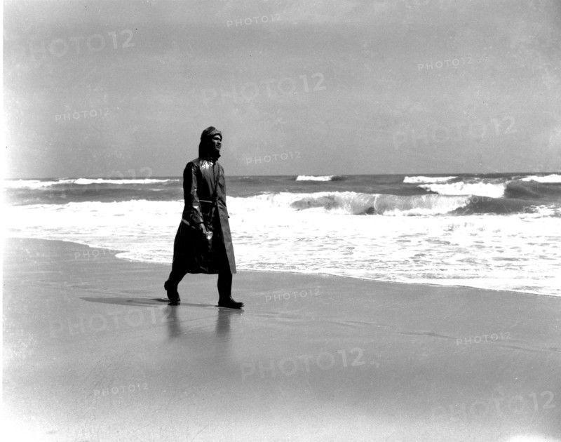 USCG Surfman patrols the beach at the Pea Island Lifeboat Station during World War II