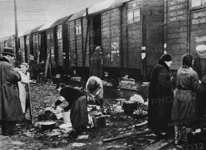 Warsaw Uprising - German Transit Camp in Pruszków (Dulag 121). Transport with expelled Polish civilians leaves the camp ca. 1944