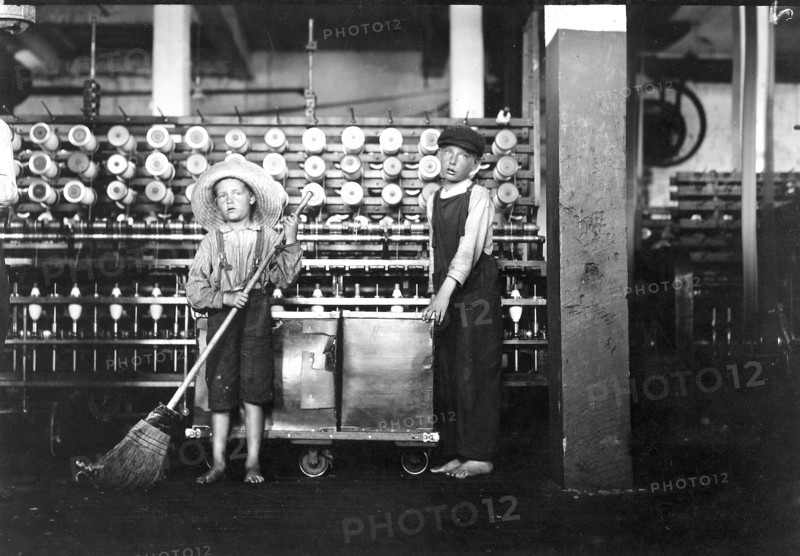 Ronald Webb, 12 years old, a doffer boy, and Frank Robinson, 7 year old who helps sweep and doff, May 1911