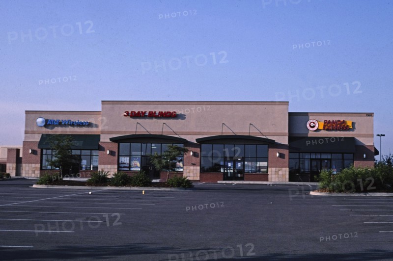 2000s America -  Three stores, Quebec Plaza (AT&T Wireless, 3 Day Blinds, Panda Express), Quebec Street, Denver, Colorado 2004