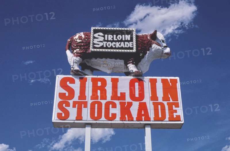 1980s America -  Sirloin Stockade sign, Hobbs, New Mexico 1982