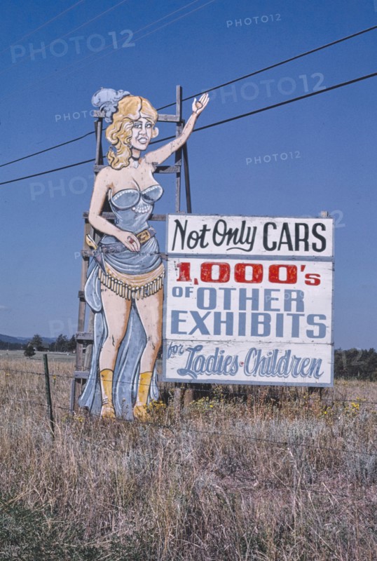1980s America -   Horseless Carriage Museum billboard, Rapid City, South Dakota 1987
