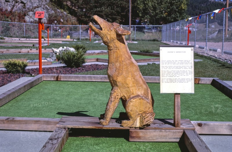 1980s America -  Golden West mini golf, coyote, straight on, Hill City, South Dakota 1987