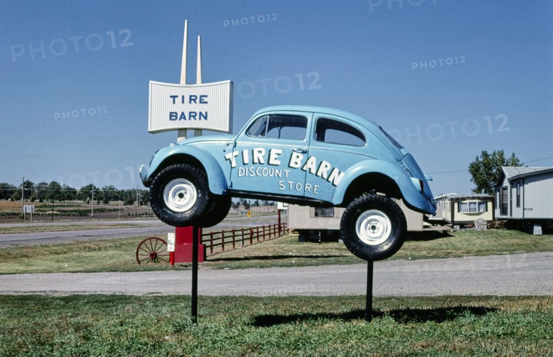 1980s United States -  Tire Barn sign, Route 50, Yankton, South Dakota 1987