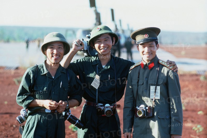 Two Viet Cong and a North Vietnamese Army officer