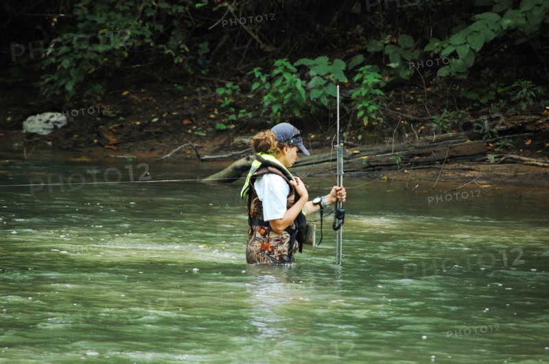 USGS employee conducts measurement at USGS gage 03198500 in Big Coal River at Ashford WV ca. 2010