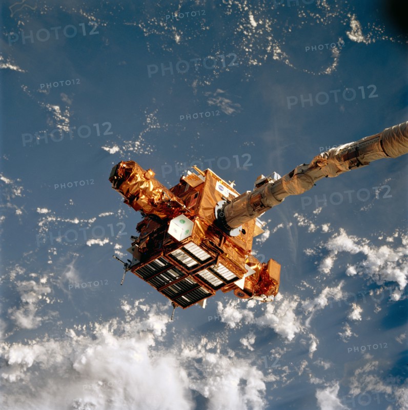 SPARTAN satellite on RMS arm prior to release