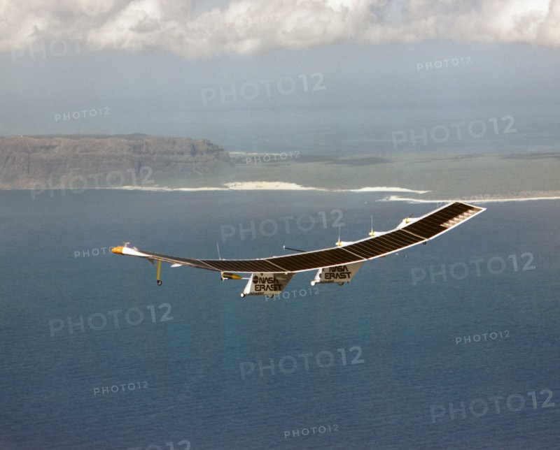 Pathfinder in flight over Hawaii - Pathfinder, NASA's solar-powered, remotely-piloted aircraft is shown while it was conducting a series of science flights to highlight the aircraft's science capabilities while collecting imagery of forest and coastal zon