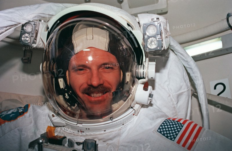Middeck activity during EVA preparations and flight deck activity