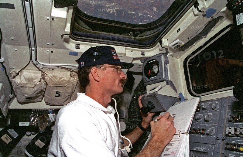 Flight deck activity during EVA 3 on Flight Day 6