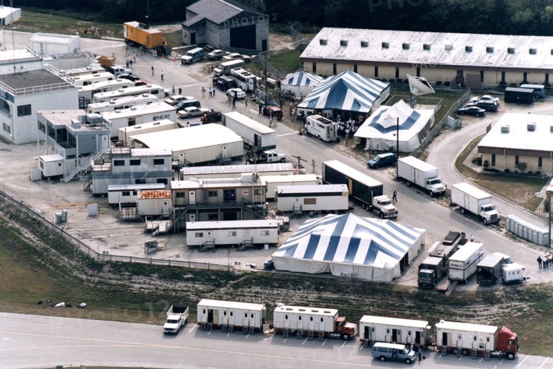 The filming of scenes for the movie "Contact" by Warner Bros.' cast and crew at Kennedy Space Center's Launch Complex 39 Press Site ca. 1997