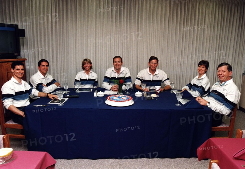 The STS-83 flight crew enjoys the traditional pre-liftoff breakfast in the crew quarters of the Operations and Checkout Building ca. 1997