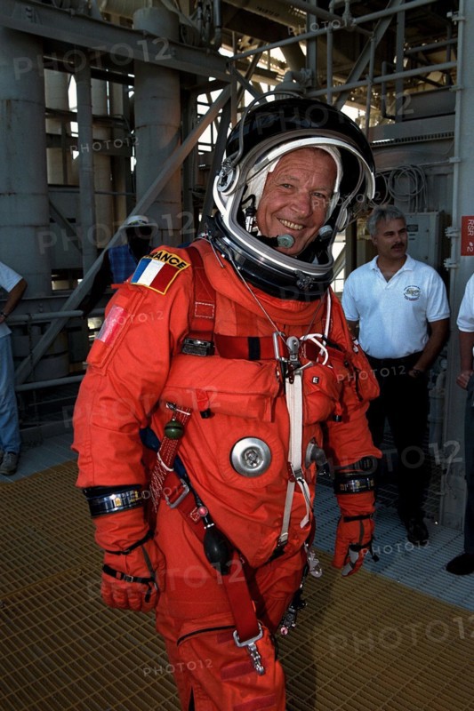 Dressed in his orange launch and entry spacesuit, STS-86 Mission Specialist Jean-Loup J.M. Chretien of the French Space Agency, CNES, participates in Terminal Countdown Demonstration Test (TCDT) activities at Launch Pad 39A ca. 1997