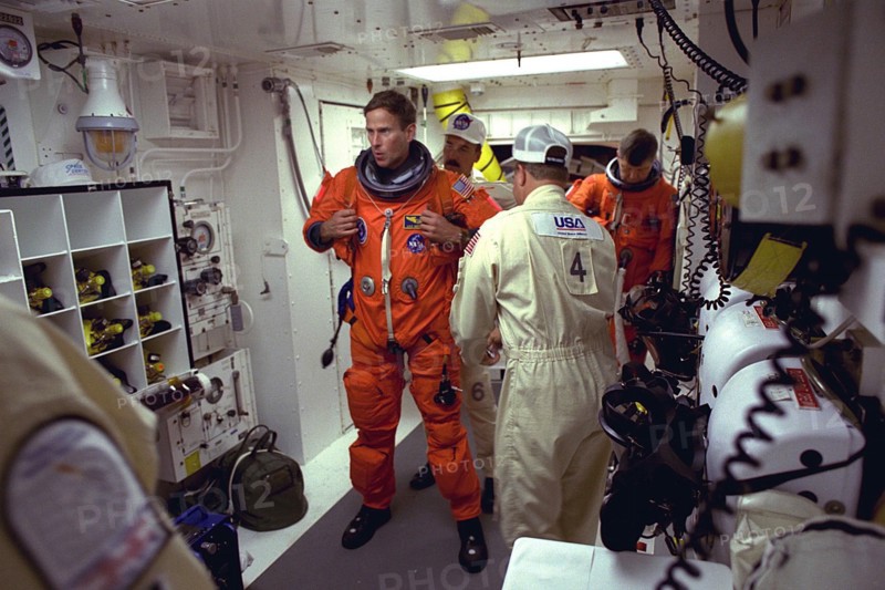 STS-94 Mission Specialist Michael L. Gernhardt prepares to enter the Space Shuttle Columbia at Launch Pad 39A in preparation for launch ca. 1997