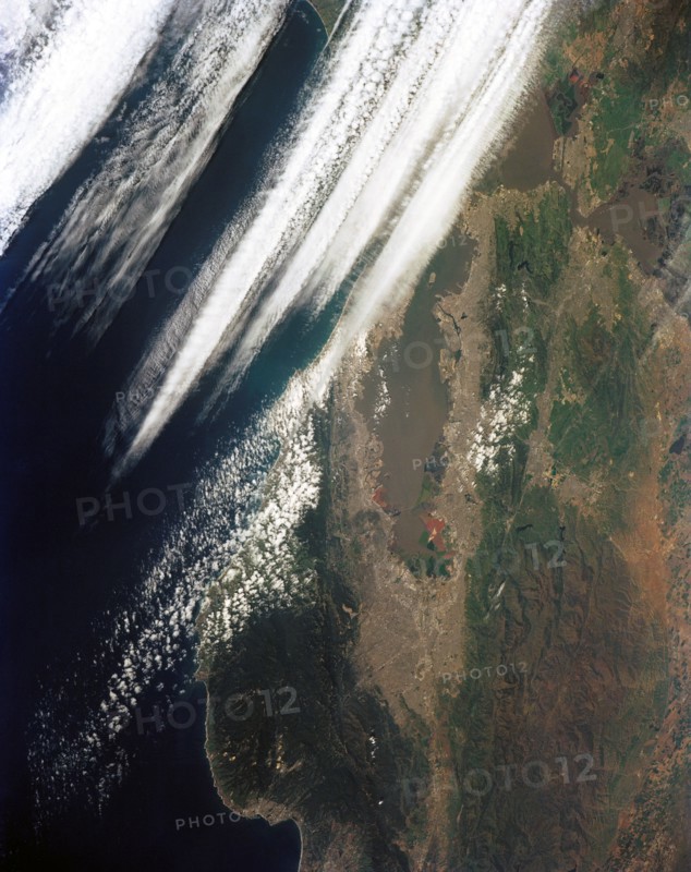 (28 April-6 May 1991) --- Large format (five-inch) frame of the San Francisco/Oakland Bay Area of northern California. Stratus clouds at 35,000 feet and cumulus clouds at about 15,000 feet are seen over the Pacific Coast, obscuring the Golden Gate Bridge.