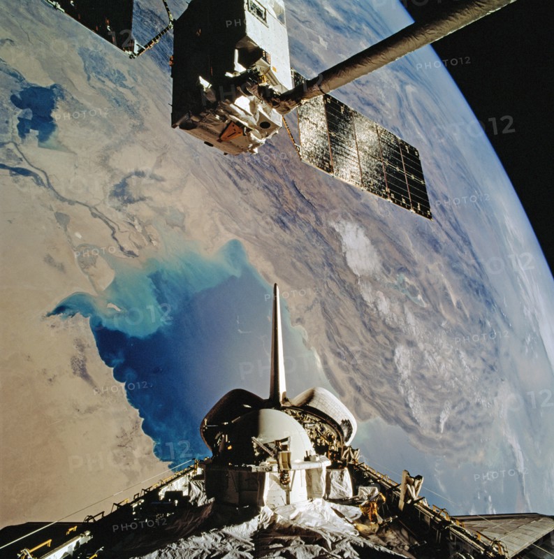 1992 - OV-104's RMS grapples EURECA-1L and holds it in deployment position above PLB