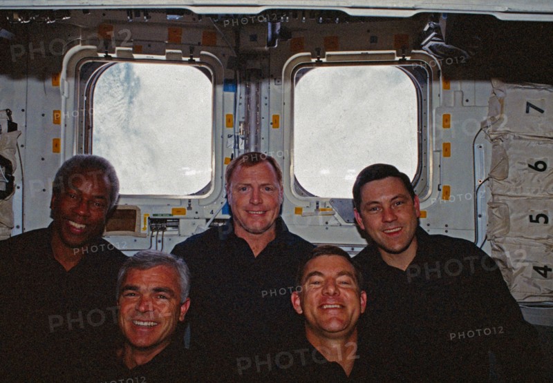 In orbit crew group portrait in the aft flight deck.