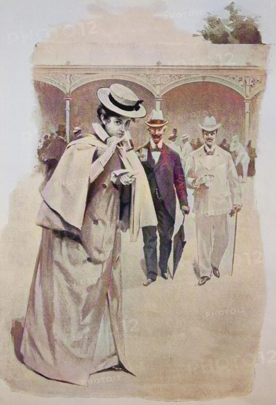 Elegant woman on walk on the spa promenade