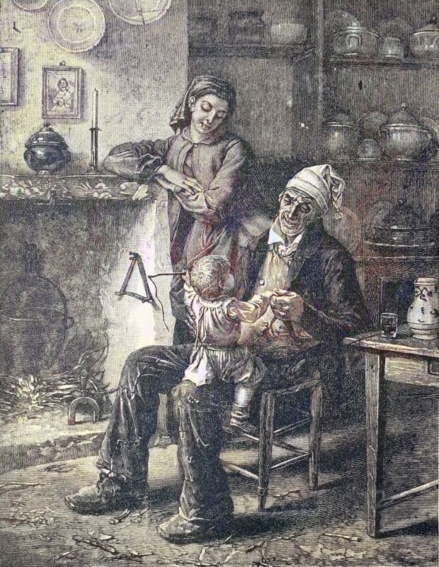 Grandfather plays with the grandson on his knee