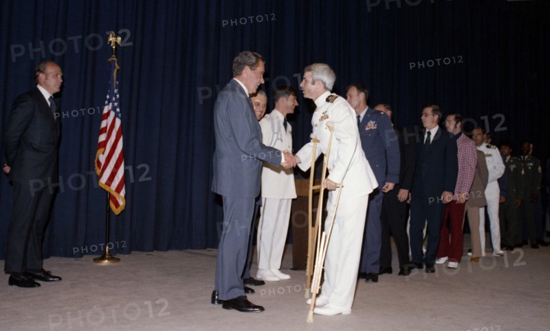 President Nixon greets former prisoner of war John McCain
