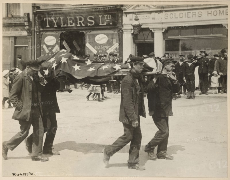Carrying a body recovered from the sinking of the Lusitania