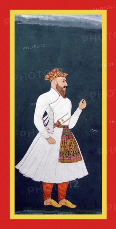 with dagger Muhammad Amín Khan in embroidered sash