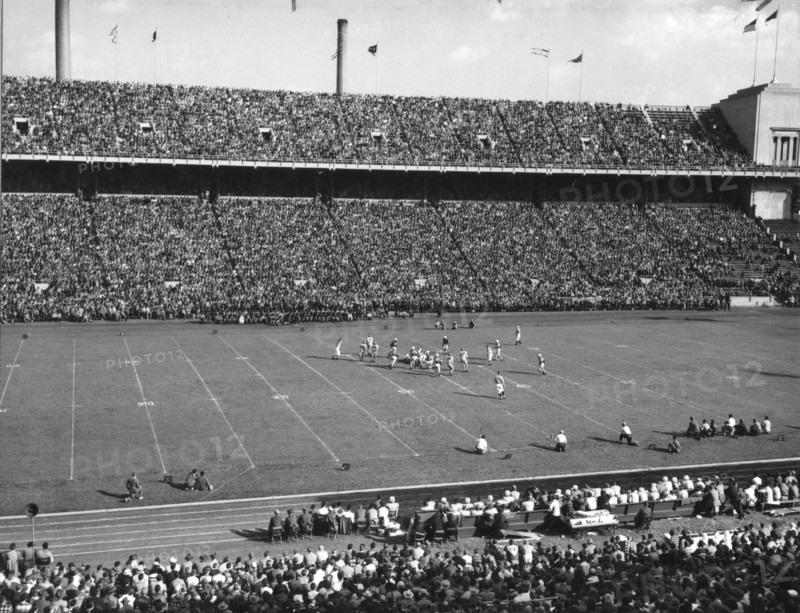 Sixty-three thousand football fans attended the annual game between Ohio State University and the University of Iowa. Columbus, Ohio, 1948.