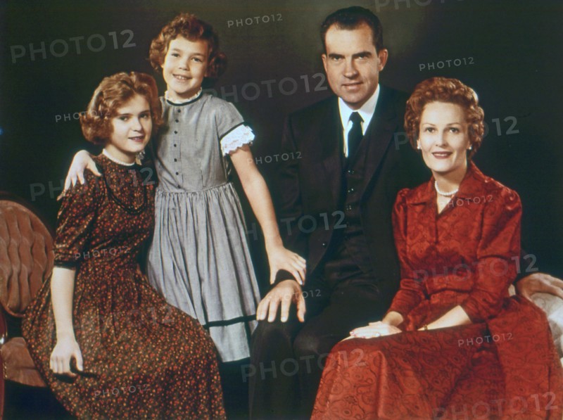 The Richard M. Nixon family in 1960. From left to right: Daughters Tricia and Julie, Vice-President Richard Nixon and wife Pat Nixon. 1960.