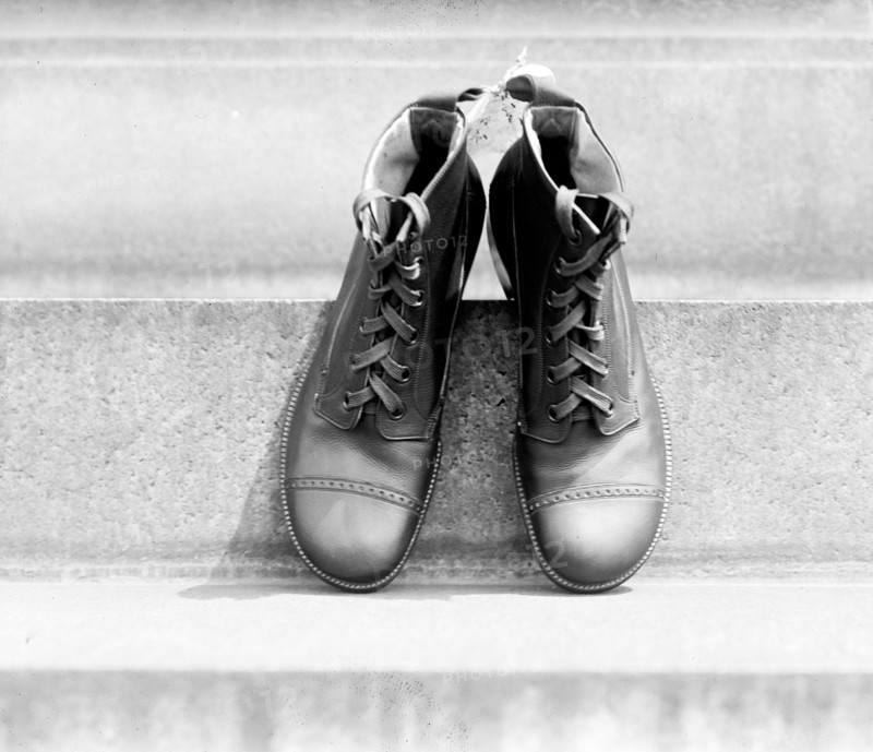 Close up of a pair of shoes ca. 1909-1914