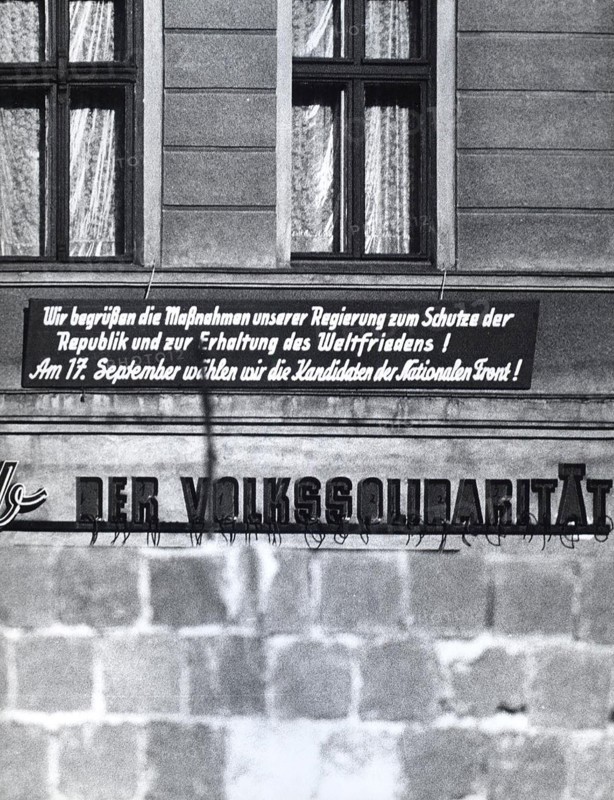 East German Banner Reads'We Agree with the Measurements Taken By Our Government in Order to Protect the Republic and to Promote World Peace! We Will Vote the Candidates of the National Front on Sept. 17th. The People Solidarity.'
