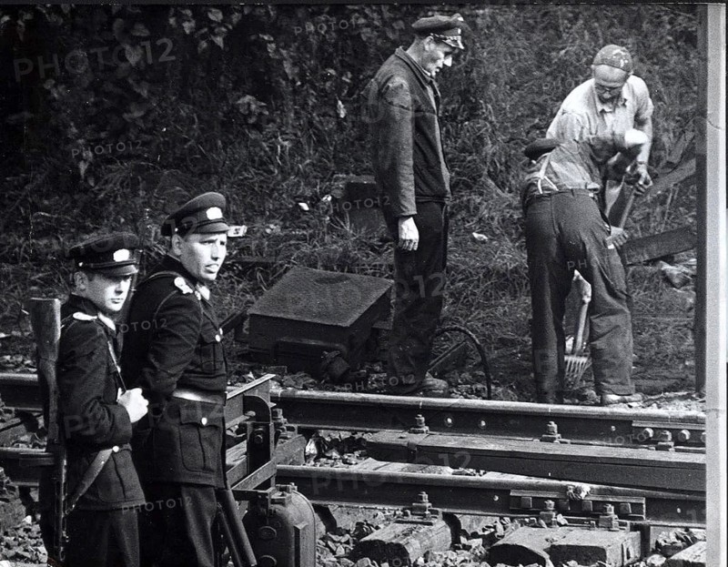 Guarded Construction Workers Demolishing Train Tracks on Thursday Morning (Sept. 28) at Wornholmer Strasse at the Border to West Berlin District Reinickendorf