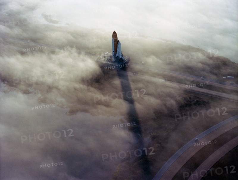 the 'Challenger' - STS-6 - being  Rolled Out to Pad 39A in the morning fog, 11/30/1982