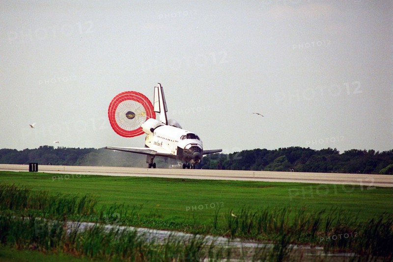 The orbiter drag chute deploys after Atlantis