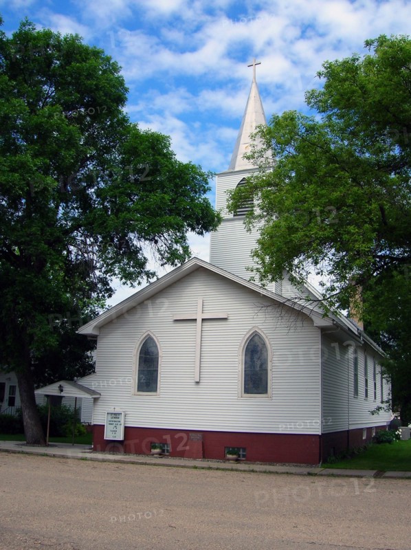 Paul's Lutheran Church (1914) raises a pretty white steeple to the sky in Kathryn.