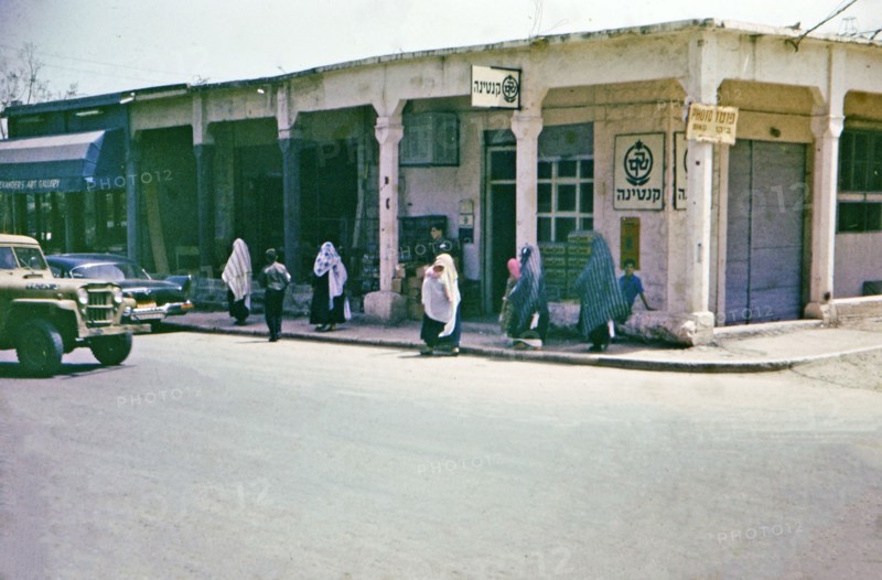Arab women walking along the street in this Tiberias Israel street scene
